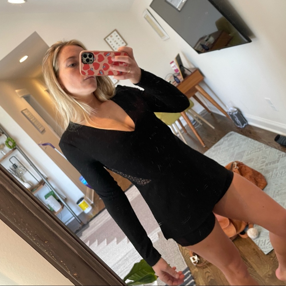black peplum top with see through detailing